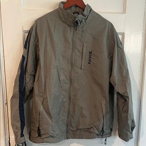 Nike Men's Gray Windbreaker with Blue Stripes